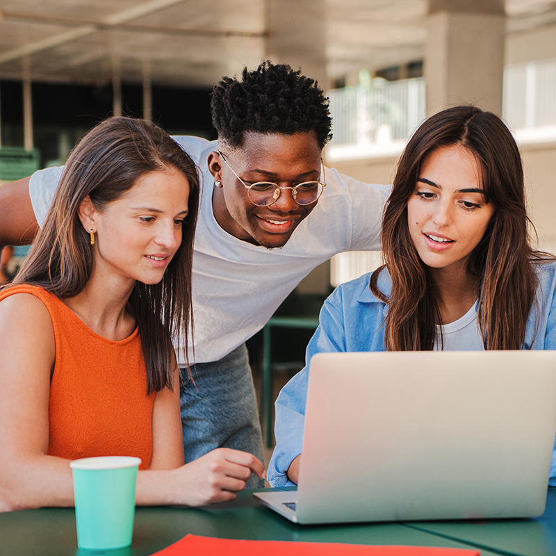 A group of 3 students collaborating